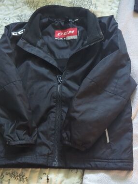 CCM Kids Black Puffer Jacket with Red Logo
